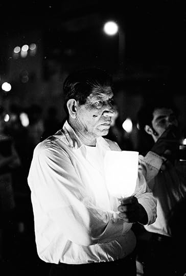 Manuel G. Barrera Jr , Evening vigil at LAPD Parker Center, ca. 1971. © the artist and courtesy the UCLA Chicano Studies Research Center 