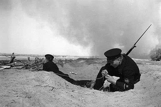 Soviet naval infantry signal troops setting up communication wires, Stalingrad, Russia, 1 Aug 1942 (Russian International News Agency)
