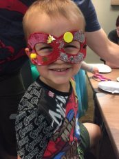 Sammy wearing his superhero mask at Nine Worlds Geekfest 2017