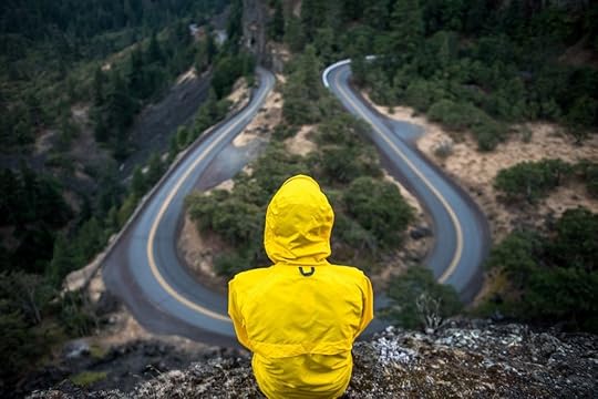 Person looking at bend in the road