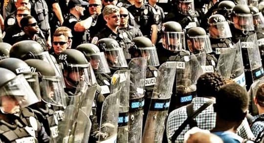 A Charlottesville police officer claims the riots, which pitched white supremacists against Antifa, were set up to further the agenda of the elites.