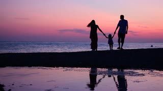 man, woman and child