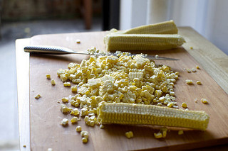 cutting kernels from the corn