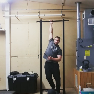Hofamaniac Rob Brinkley stretching in his garage gym
