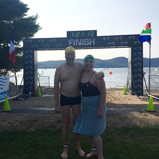 We stand just beyond the finish line shortly after strolling across it.