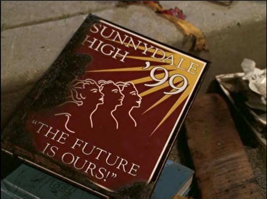 A 1999 Sunnydale High yearbook with a slightly charred cover.