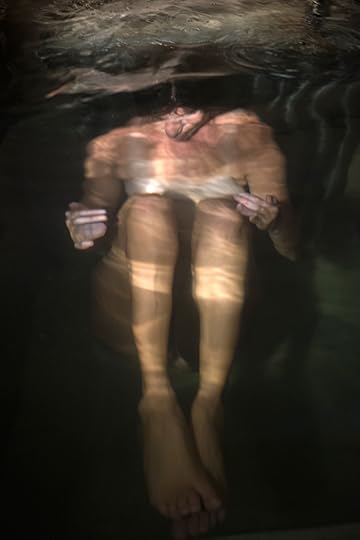 Tanya Habjouqa, She Immerses, 2016, from the series Sacred Space Oddity: The Un/Holy Land © the artist and courtesy ILEX Gallery, Rome 