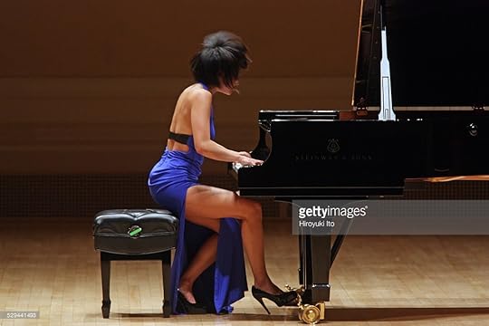 Yuja Wang performing the music of Schubert, Liszt, Scriabin and Balakirev at Carnegie Hall on Thursday night, December 11, 2014.