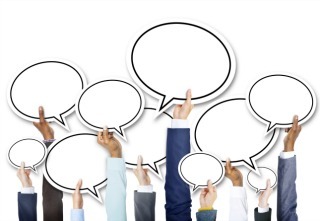 Group of Business Hands Holding Speech Bubble