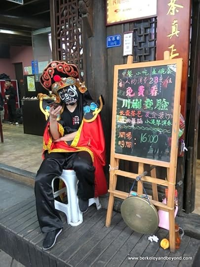 bored barker on Jinli Old Street in Chengdu, China