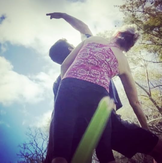 lisa kirchner adjusting a yoga pose