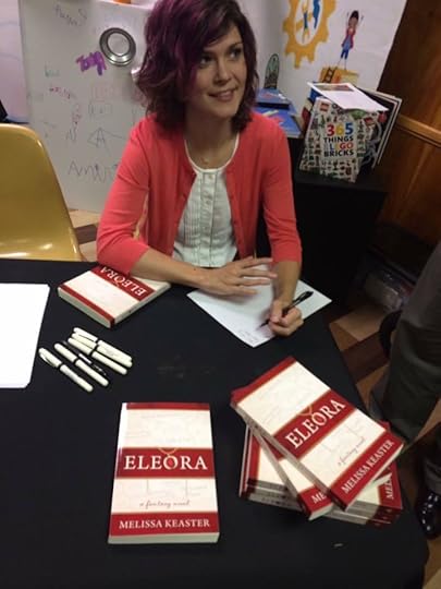What redemption looks like: Melissa signing copies of her book. In public. Without a mask.