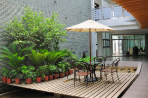 House patio with umbrella's table and chairs