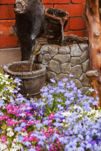 small residential paved garden water feature or waterfall