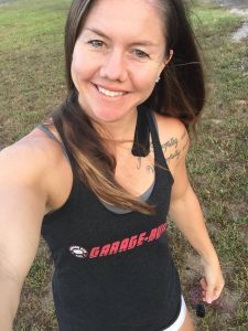 Mobile trainer Anna Woods prepares to train clients in her Garage Built Tank from garagegymlife.net