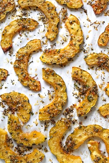  Roasted Delicata squash topped with a Parmesan-herb crust, I like to leave it in the oven until the edges are crisp, golden and delicious! Acorn squash can be used in place of Delicata.