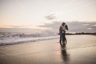 kissing on the beach