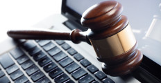 gavel-resting-on-a-laptop-computer-1280x720-istockphoto
