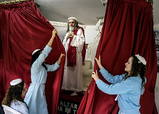 Jonas Bendiksen, Disciples shut the curtains in front of INRI Cristo after he has delivered the sermon of the day, Brazil, 2014 © the artist/Magnum Photos