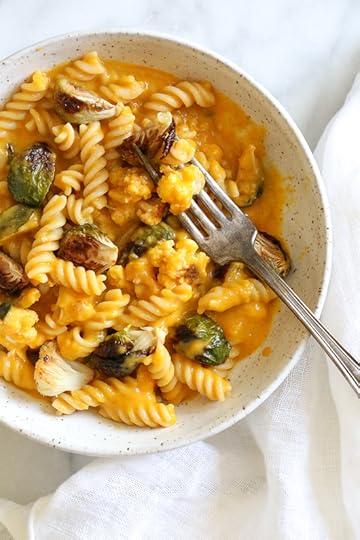 It's October, so Pumpkin Mac and Cheese with Roasted Cauliflower and Brussels Sprouts is a must for the Fall! Using pumpkin puree makes a creamy light cheese sauce, without having to add cream or too much cheese. You can make your own pumpkin puree or use organic canned pumpkin to make it faster!