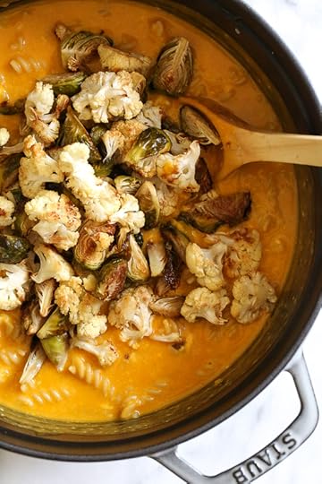 It's October, so Pumpkin Mac and Cheese with Roasted Cauliflower and Brussels Sprouts is a must for the Fall! Using pumpkin puree makes a creamy light cheese sauce, without having to add cream or too much cheese. You can make your own pumpkin puree or use organic canned pumpkin to make it faster!