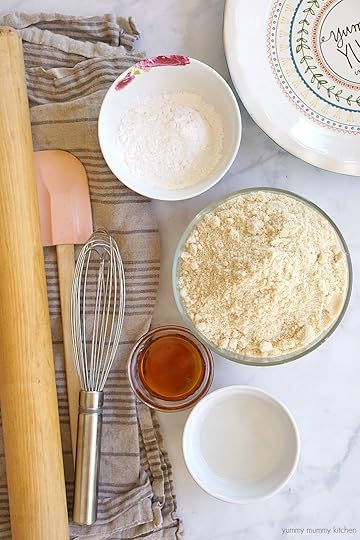 This gluten free vegan pie crust is made with almond flour, maple syrup, arrowroot, and coconut oil.