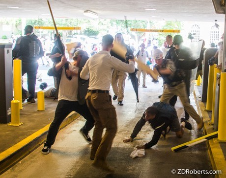 A group of neo-Nazis attack DeAndre Harris.