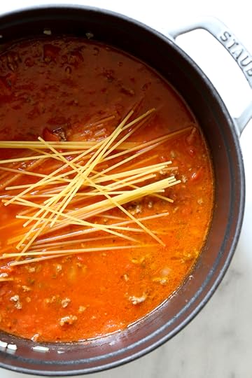 This EASY Spaghetti and Meat Sauce is cooked all in one pot! The meat sauce is made from scratch on the stove and cooked with the spaghetti all at the same time. No extra pots to wash, fast and delicious!