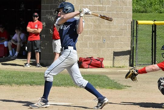 Image result for baseball player swinging a wooden bat