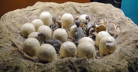 Nest of eggs with dragons hatching from them.