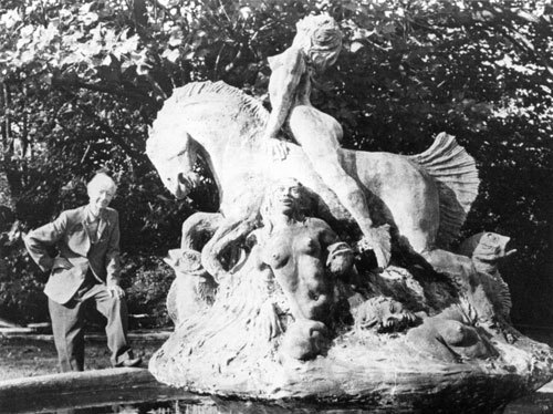 Norman Lindsay with seahorse statue