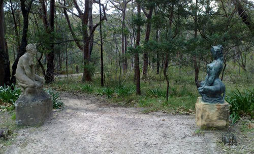 Satyr and Sphinx guarding the bush swimming pool entrance 