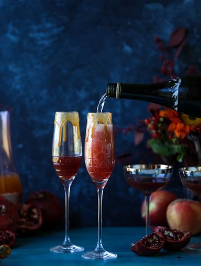pomegranate cider mimosas with a salted caramel rim I howsweeteats.com #cocktails #thanksgiving #applecider #mimosas