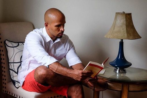 Combining Passions - Goldin Martinez reading a book 
