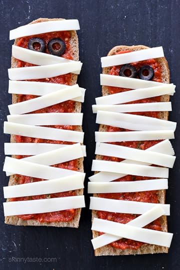 These EASY French bread pizzas are perfect for your next Halloween party, for kids or adults! Just 4 ingredients and about 15 minutes to make!
