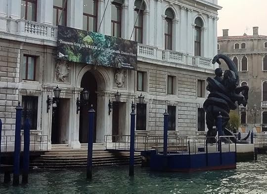 Punta della Dogana, the former customs house, now an art gallery with exhibition by Damian Hirst and modern statue of Laocoön and his sons wrestling snakes (about to be swallowed, see magnified image)