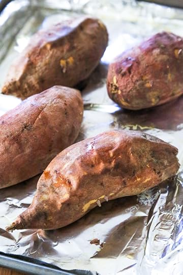 These savory stuffed sweet potatoes are topped with Italian flavors such as marinara sauce and cheese. A quick and easy healthy vegetarian dish.
