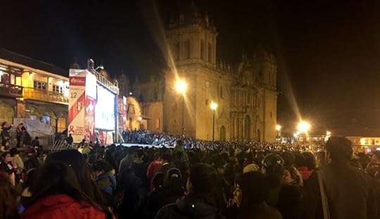 Cuzco Watches Futbol Game in Plaza