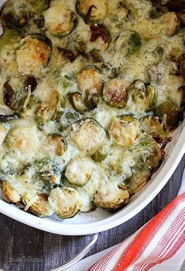 Brussels Sprouts Gratin are the perfect Holiday side dish! The brussels sprouts are roasted until crisp, then topped with a light cheese sauce made with Gruyere and parmesan, and baked until brown and bubbling. If you are as obsessed with brussels sprouts as I am, you'll love these.