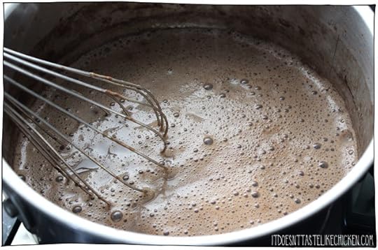 Easy Vegan Hot Chocolate with toasted marshmallow fluff! Yes please! This dairy-free treat whips up in just 15 minutes (including making the marshmallow fluff) for the perfect winter holiday treat. #itdoesnttastelikechicken