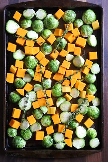 Roasted Brussels Sprouts and Butternut Squash are tossed with olive oil, salt and pepper for an easy Fall side dish! Simply place them on a sheet pan and bake until tender and the Brussels are slightly charred on the edges. 