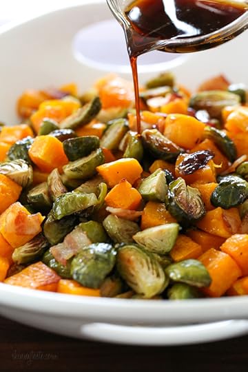 Roasted Brussels Sprouts and Butternut Squash are delicious on their own, but adding bacon and a maple soy glaze makes them over-the-top delicious! Made all on one sheet pan, you can double or triple this recipe to feed a crowd by adding more sheet pans.