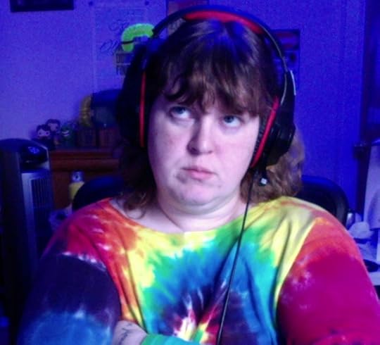 Me, wearing tie-dye and headphones, looking awesome, but also pissed off.