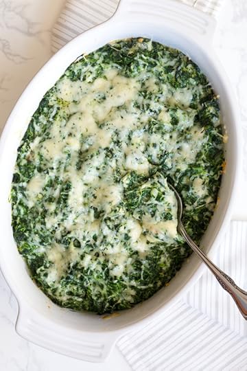 This easy makeover Spinach Gratin is creamy and decadent, with a hint of nutmeg baked in the oven topped with melted cheese for a must at your Holiday table!