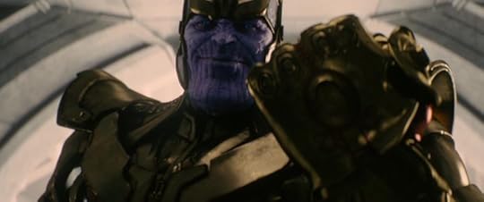 Thanks puts on his gauntlet (Avengers: Age of Ultron, 2015).