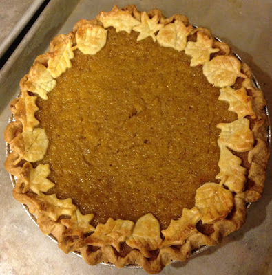 pumpkin pie with fallen leaves garnish