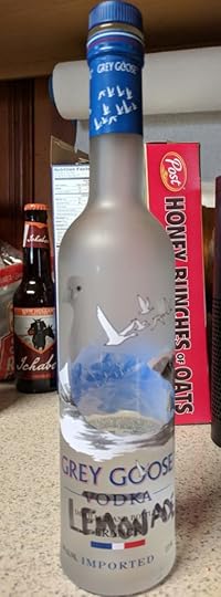 a bottle of Grey Goose, upon which I have crossed out