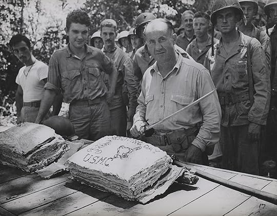 USMC Lt. Col. W.W. Stickney preparing to cut a Thanksgiving cake with a captured Japanese sword, Guadalcanal, 26 Nov 1942 (US Marine Corps photo)