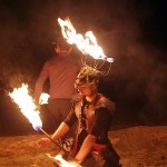 Kneeling fire dancer