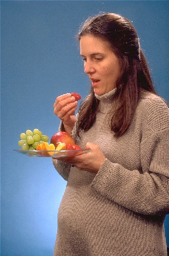 File:Pregnant woman eating.jpg